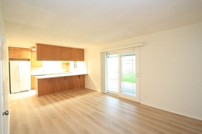 Building Photo - Welcome to this beautifully refreshed 4-bedroom, 2-bath two-story home located in desirable North...