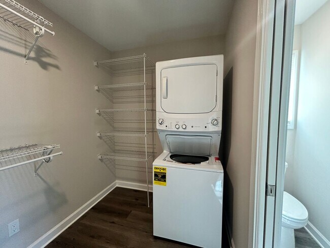 Building Photo - Three bedroom three bath available now!