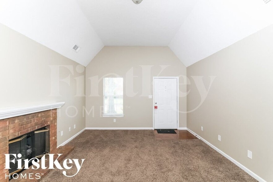 Building Photo - 8491 Highland Glen Cir N