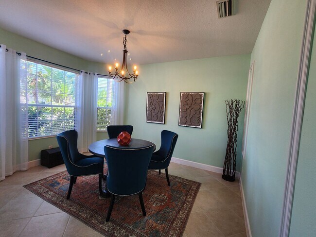 Building Photo - NORTH PORT - Rare Waterfront 4 bedroom pool home Annual/Unfurnished