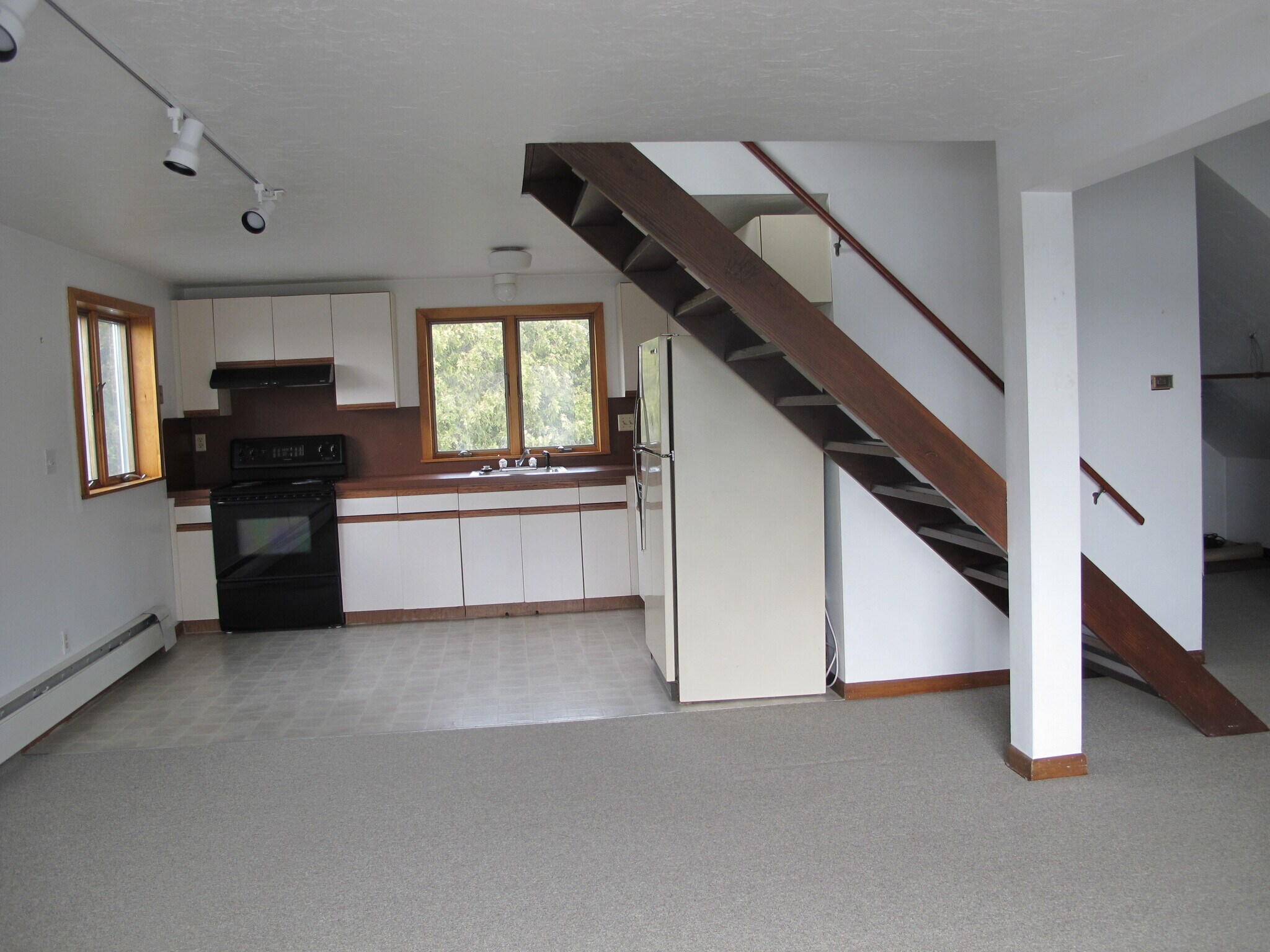 Dining area into kitchen - 61 Pleasant St