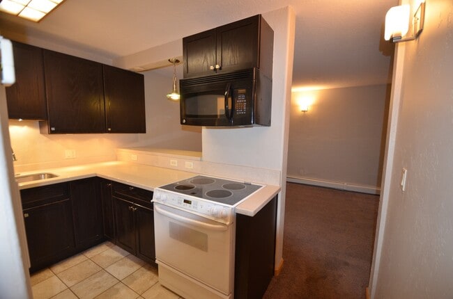 Building Photo - Updated Apartment!  Parking for 2 Cars! HEAT Included!