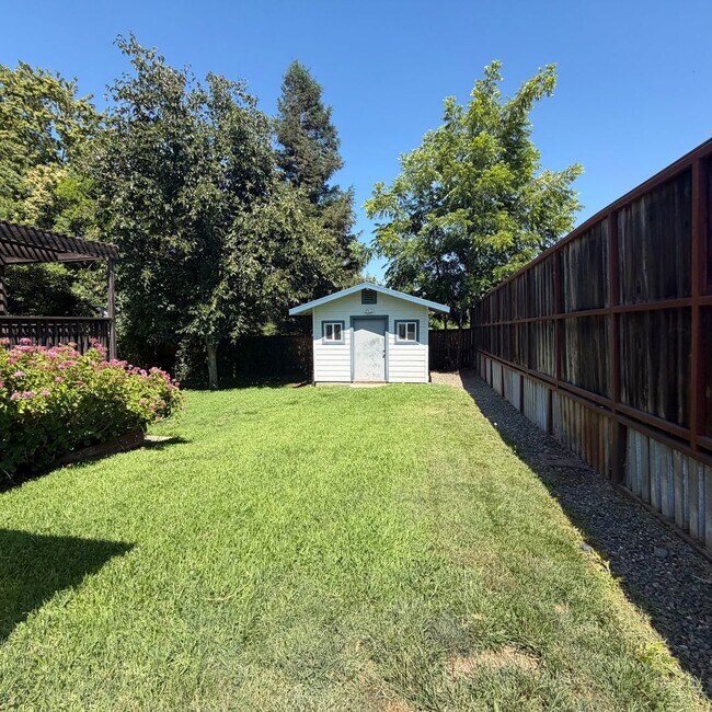 Building Photo - Adorable house with large deck,  yard and RV access