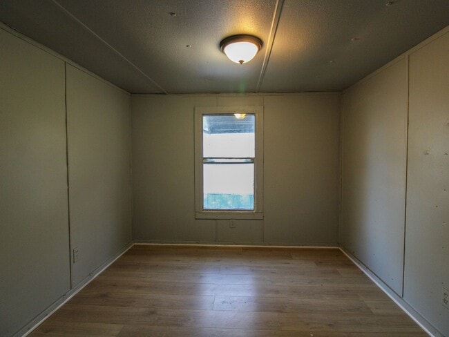 Building Photo - Discover comfortable country living in this nicely updated trailer located just minutes from Faye...