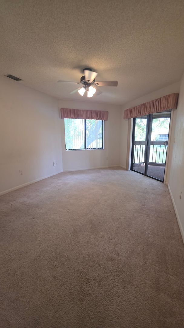 Building Photo - Beautiful Pond Front 2 Bedroom 2 Bath Townhome in the Wood Haven Community