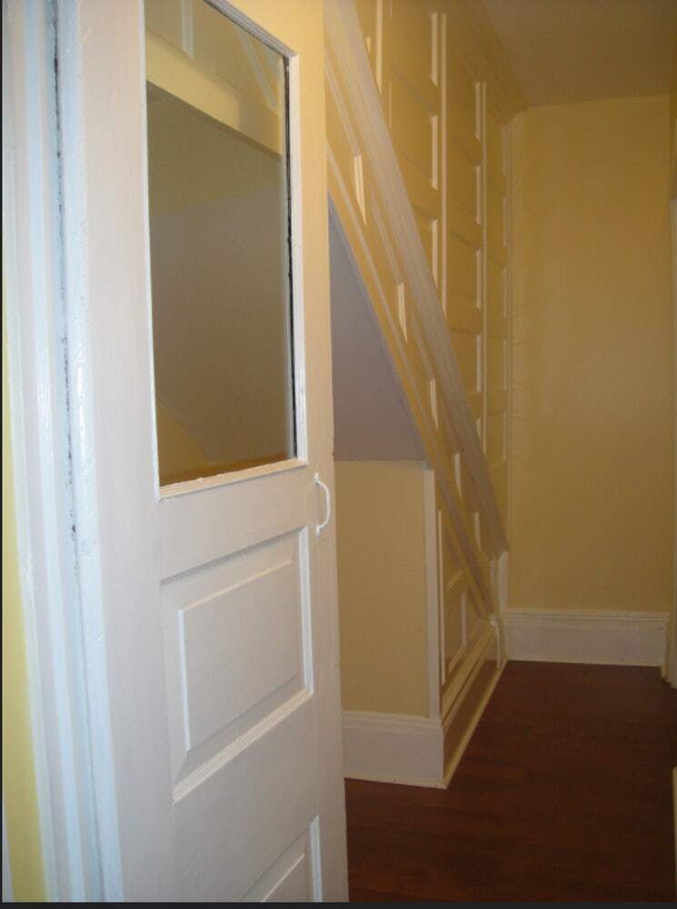 Understairs closet. Big enough to add a desk, shelving, and/or clothing rack depending on desired use. A desk will fit under the stairs. - 3284 Dawson Street