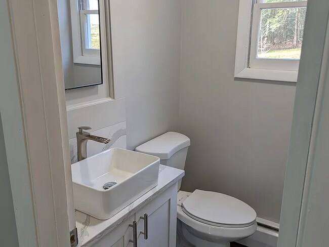 Building Photo - this contemporary & brightly remodeled 2,400 sqft home