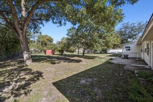 Building Photo - Stylish Renovation + Solar Savings in Prime Location