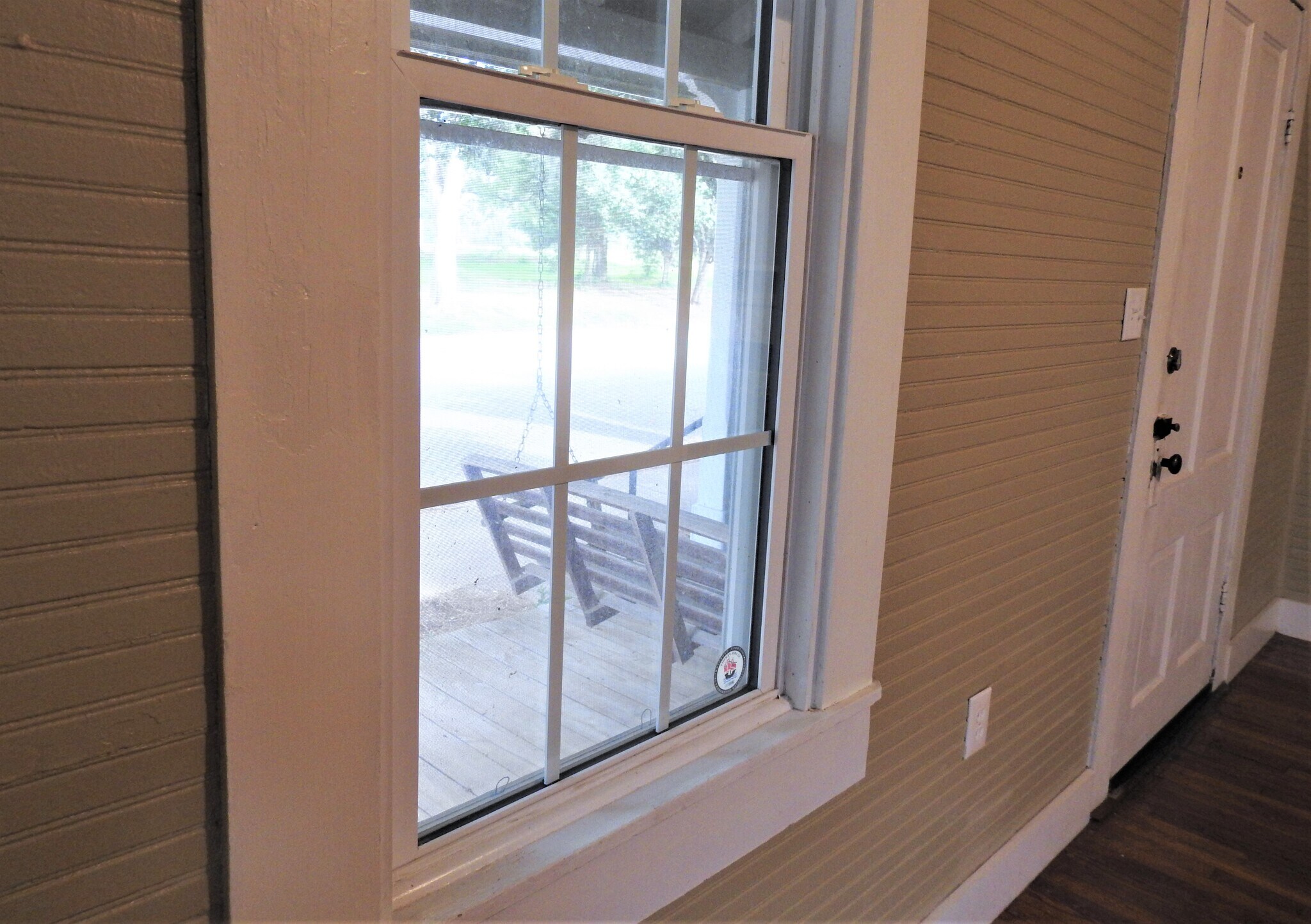 View of the front porch from the living room. - 3230 PARK AVE