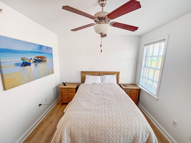 Building Photo - Fully Furnished Waterfront Elegance on Mai...