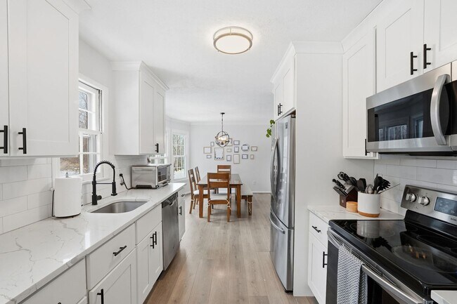 Building Photo - Updated 4BR Home with Finished Basement Minutes to Glenmont Metro!