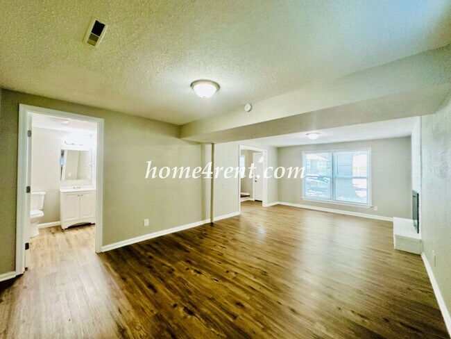 Building Photo - Updated Raytown Ranch w/ Wood Floors, SS Appliances, Finished Basement and a Fenced Yard!