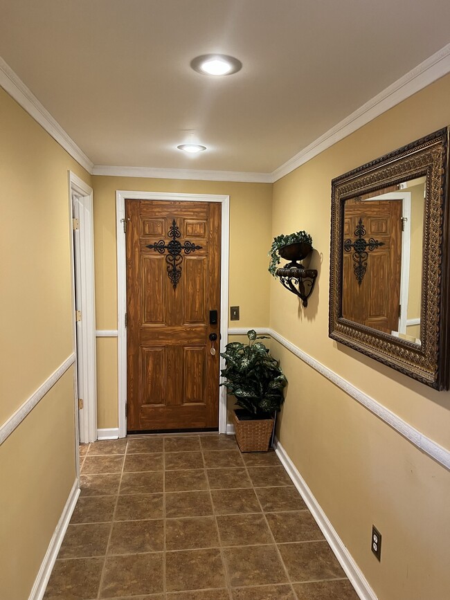 Door entrance behind the white screen door. - 3617 Sunset Rdg