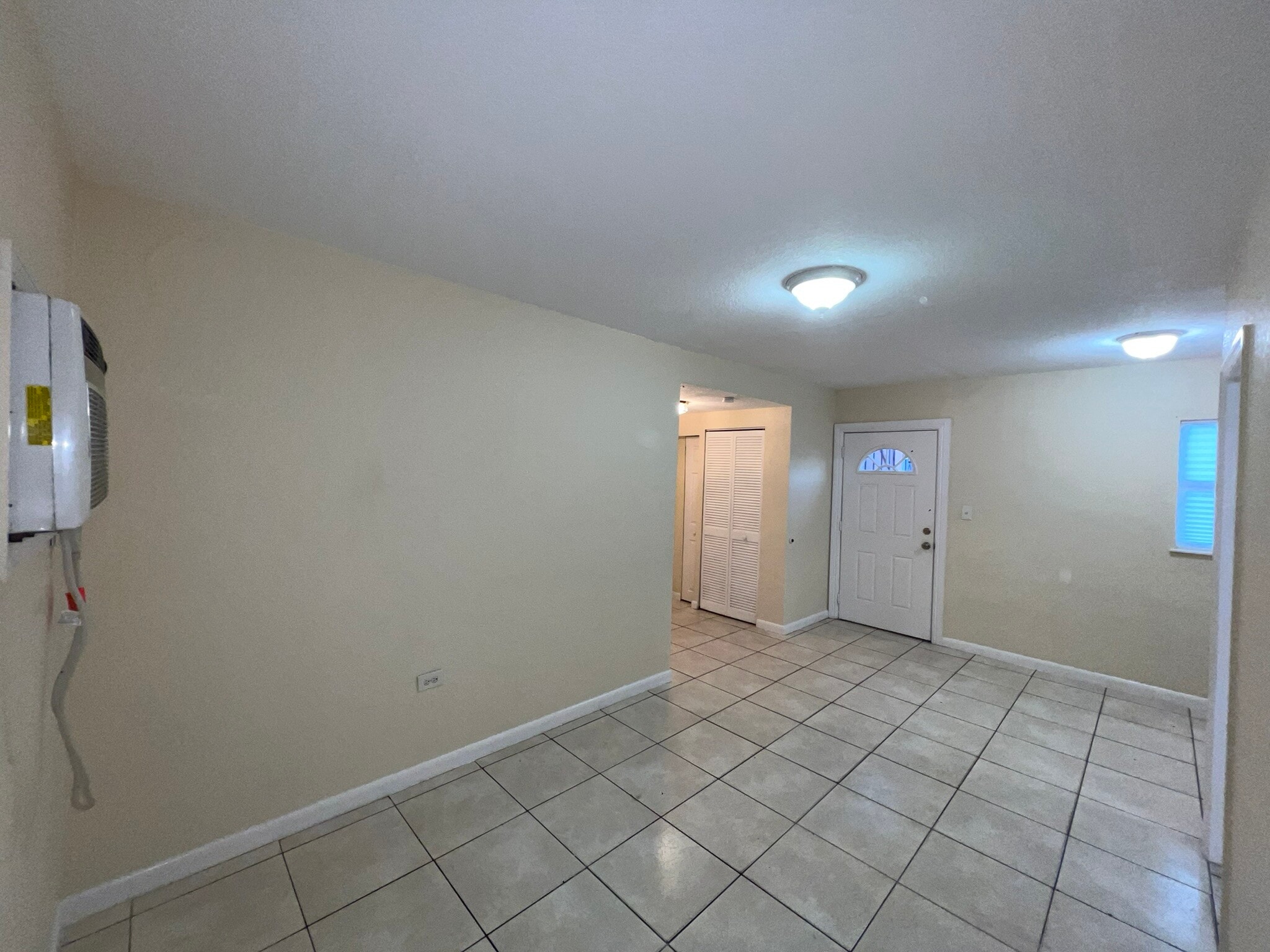 Family Facing Out | Storage Closet | Washer/Dryer | Entry Door - 774 NW 41st St
