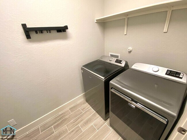 Building Photo - Smart Home Haven: Where Comfort Meets Cool...