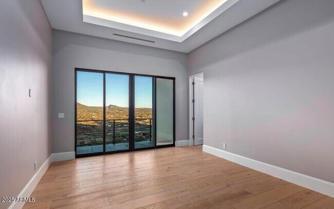 Building Photo - 4880 E Lone Mountain Rd N