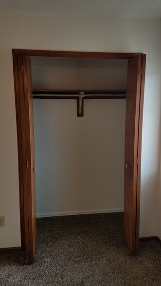 Front bedroom closet, extends 1 1/2 feet on each side of the closet doors - 6646 Provincial Dr