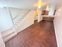 Building Photo - 2-Story Townhome with parking, in unit laundry hookups, 2bd/1.5ba!