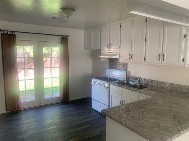 kitchen with french doors to backyard - 1745 S Bridge St