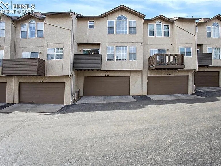 Rear View of Deck and Attached Garage - 3272 Capstan Way