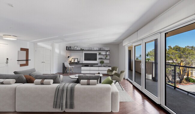 Spacious living rooms complete with hardwood flooring throughout and large patio doors that provide indoor outdoor living space - Preserve at Marin