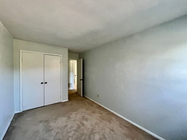 Building Photo - Three-bedroom, two-and-a-half bathrooms in...