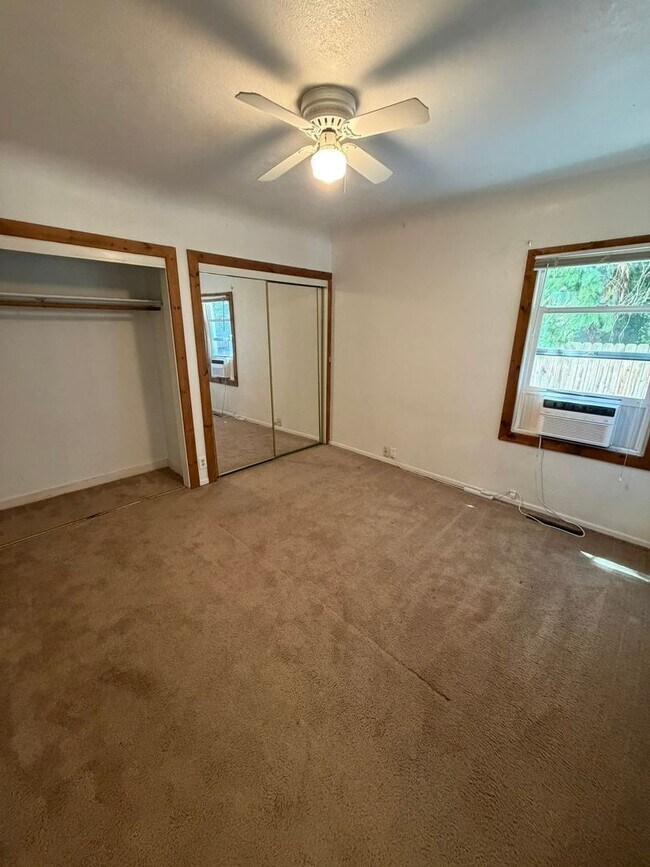 Building Photo - 2 Bedroom with a garage with Large fenced yard!
