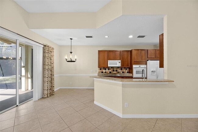 Building Photo - 9115 Pinebreeze Dr