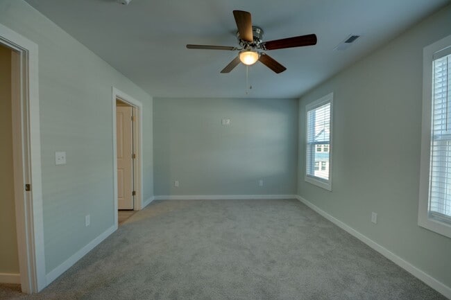 Building Photo - Beachside Village Townhomes: 3 bedroom 3.5...