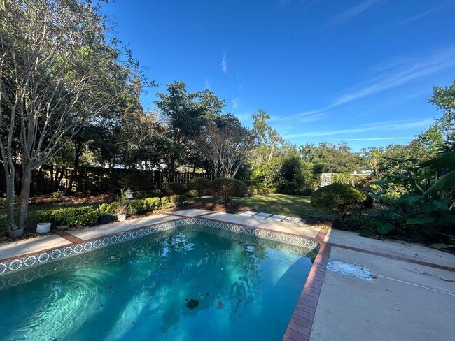 Building Photo - Breathtaking 3/3 Stunning Pool Home with a...