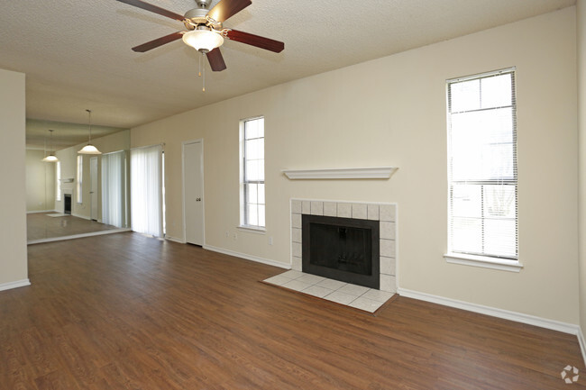 2BR,2BA - 1010SF - LIVING ROOM - Oak Tree Condominiums