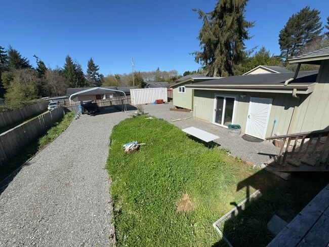 Building Photo - Newley updated 3-bedroom home features fenced yard, garage, and covered patios!