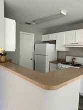 Building Photo - zEl Pueblo Dorado Apartments