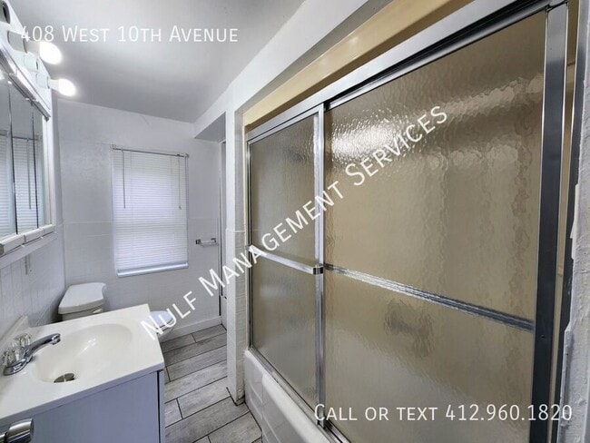 Building Photo - 408 W 10th Ave