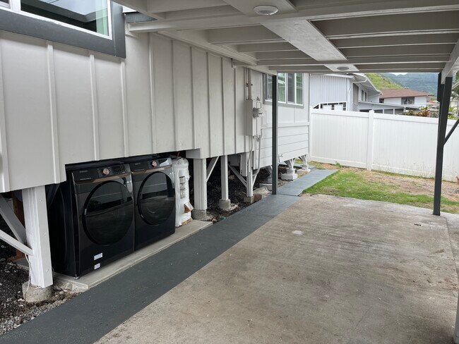 Front loading washer dryer under the house - 1774F Palolo Ave