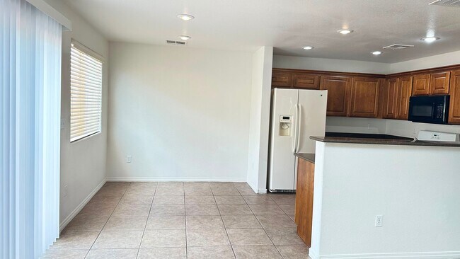 Building Photo - 5665 Rose Tiara Dr