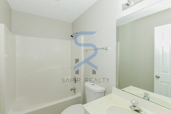 Building Photo - Move in before February 28th and choose your reward: a $250 Amazon Gift Card or a 55" Smart TV!