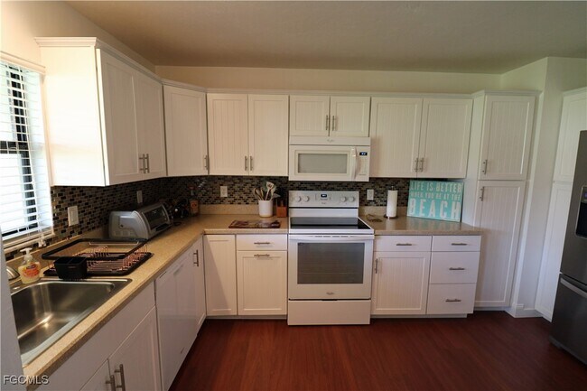 Building Photo - 9639 Eaton Gardens Ln