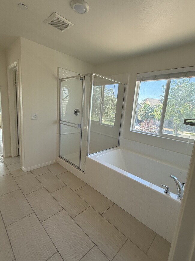 Building Photo - This beautiful home is on corner lot and with energy efficient features including solar.  New flo...