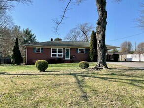 Building Photo - Home with Carport