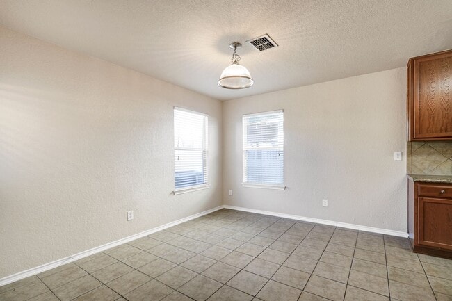 Building Photo - Stylish Two-Story Residence with Modern Co...