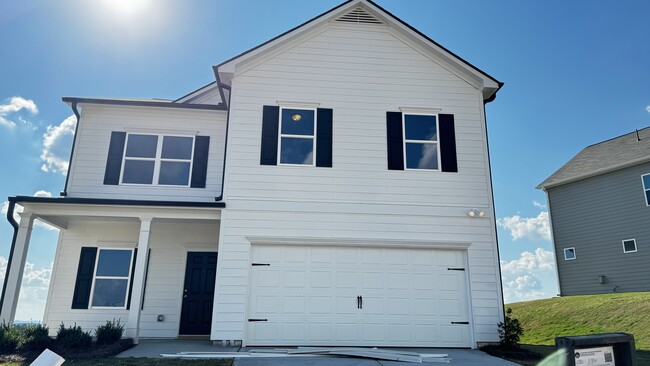 This is a brand-new single-family residence features a two story great room, 5 bedrooms, 3 full bath - 320 Chelsea St SW