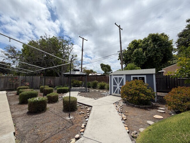 Building Photo - Bright, Updated Bungalow with 250 SF Bonus Sunroom