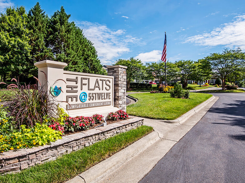 Monument Sign at Community Entrance. - The Flats at 55 Twelve