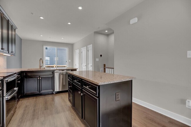 Building Photo - Luxury 4-Story Townhome with Rooftop Terrace!