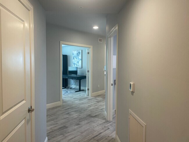 Building Photo - Coastal Luxury at Hidden Bay | 3BR Waterfront Condo with Bay Views