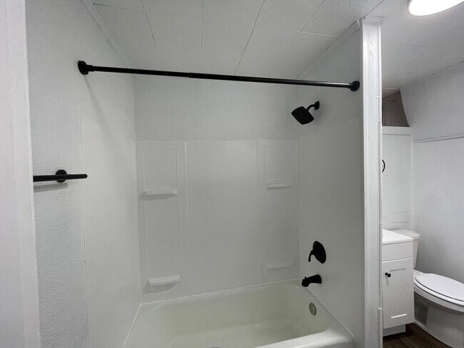 Building Photo - AVAILABLE MAY 2026 - Spacious 3 Bedroom Home w/ Non-Traditional Layout!