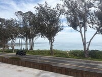 Building Photo - Remodeled Coastal Condo with Panoramic Ocean Views – One Block from New Brighton Beach