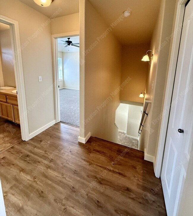 Building Photo - Updated 3 BR/2.5  BA with new flooring and paint!