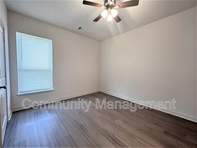 Building Photo - 7677 River Ridge Dr